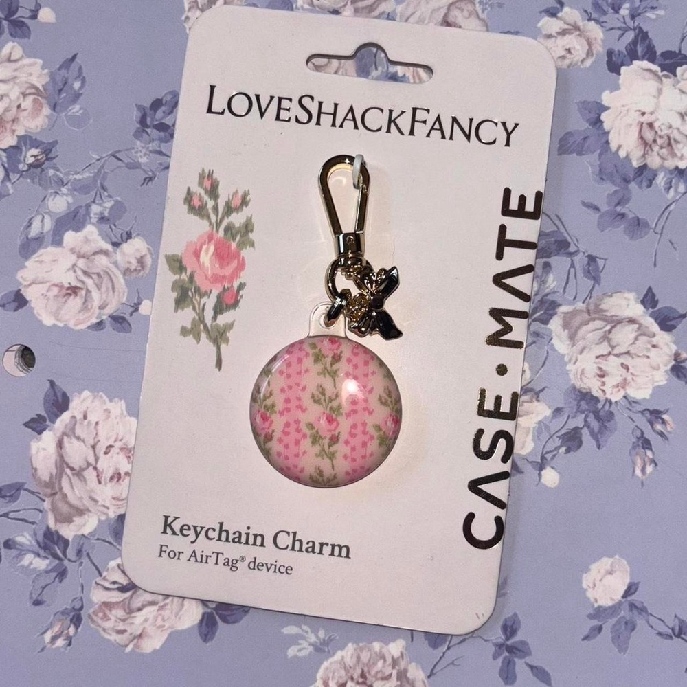 LoveShackFancy x case mate AirTag charm with pink floral design